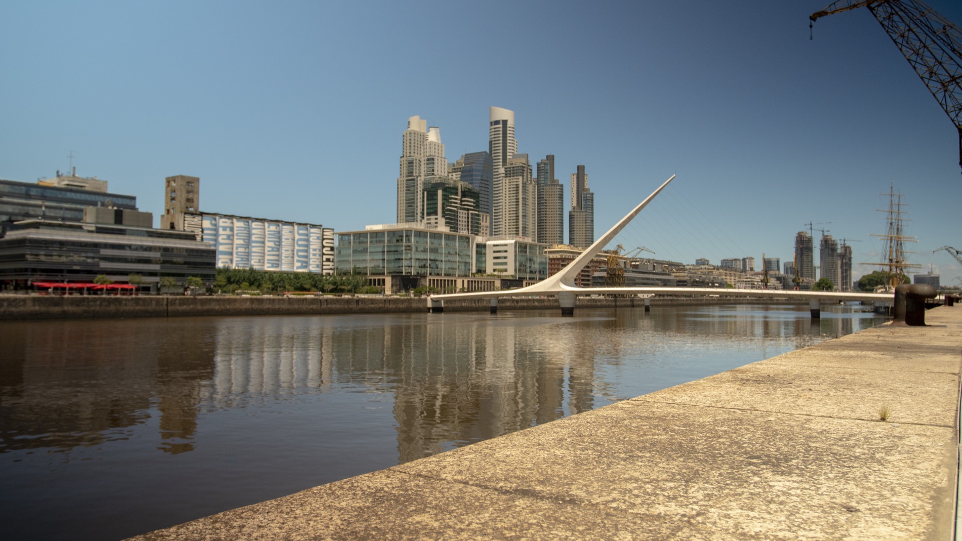 Puerto Madero skyline and the Puente de la Mujer reflected in the water, Buenos Aires
