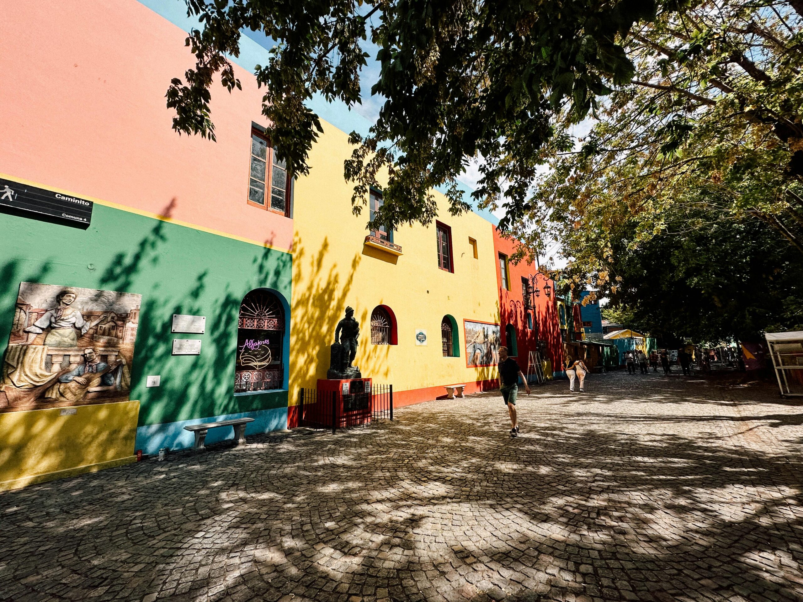 Caminito in La Boca with chapa houses painted pink, yellow, red and green