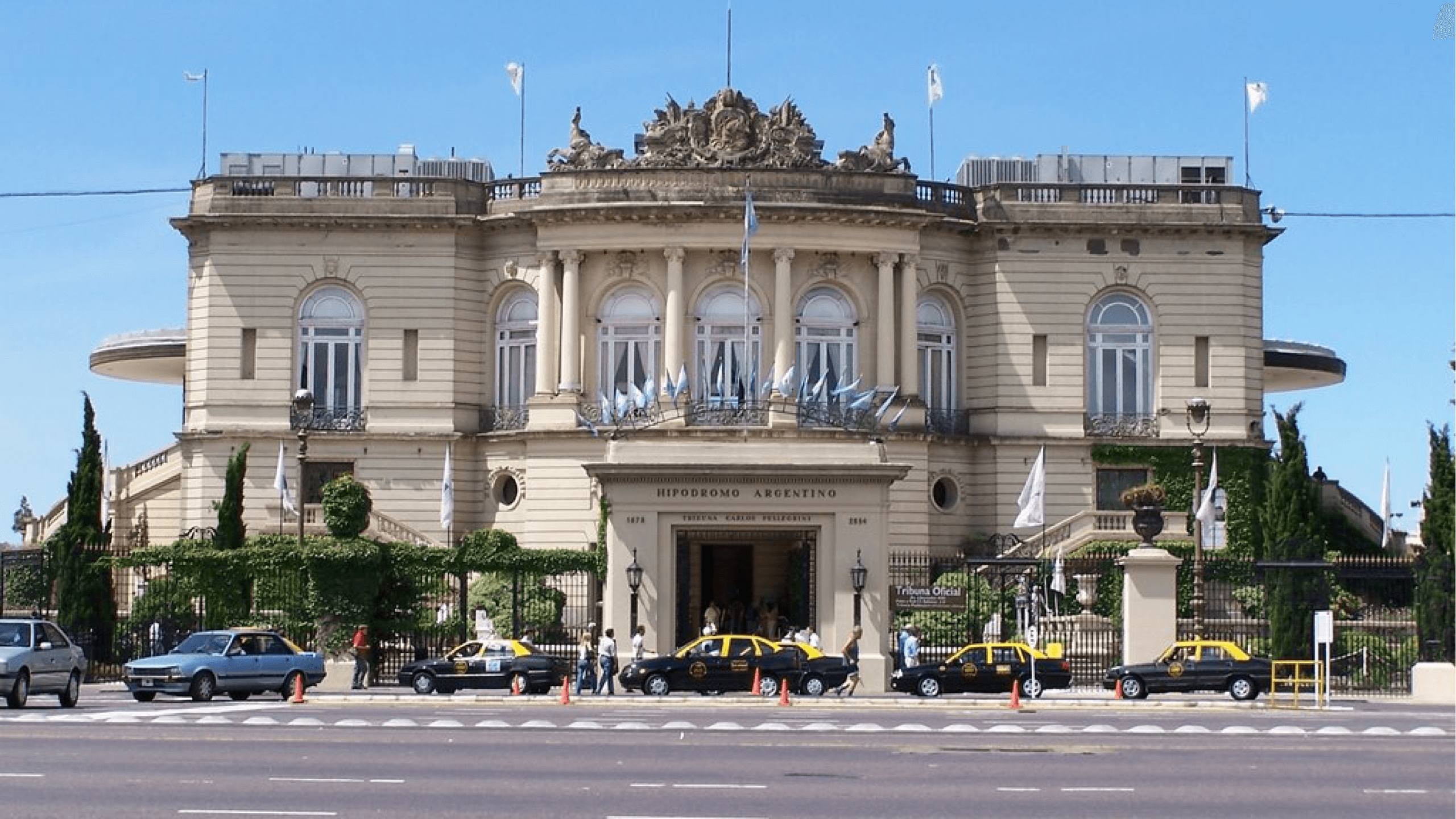 A classic corner of the city of Buenos Aires, the Hipodromo de Palermo with taxis waiting outside