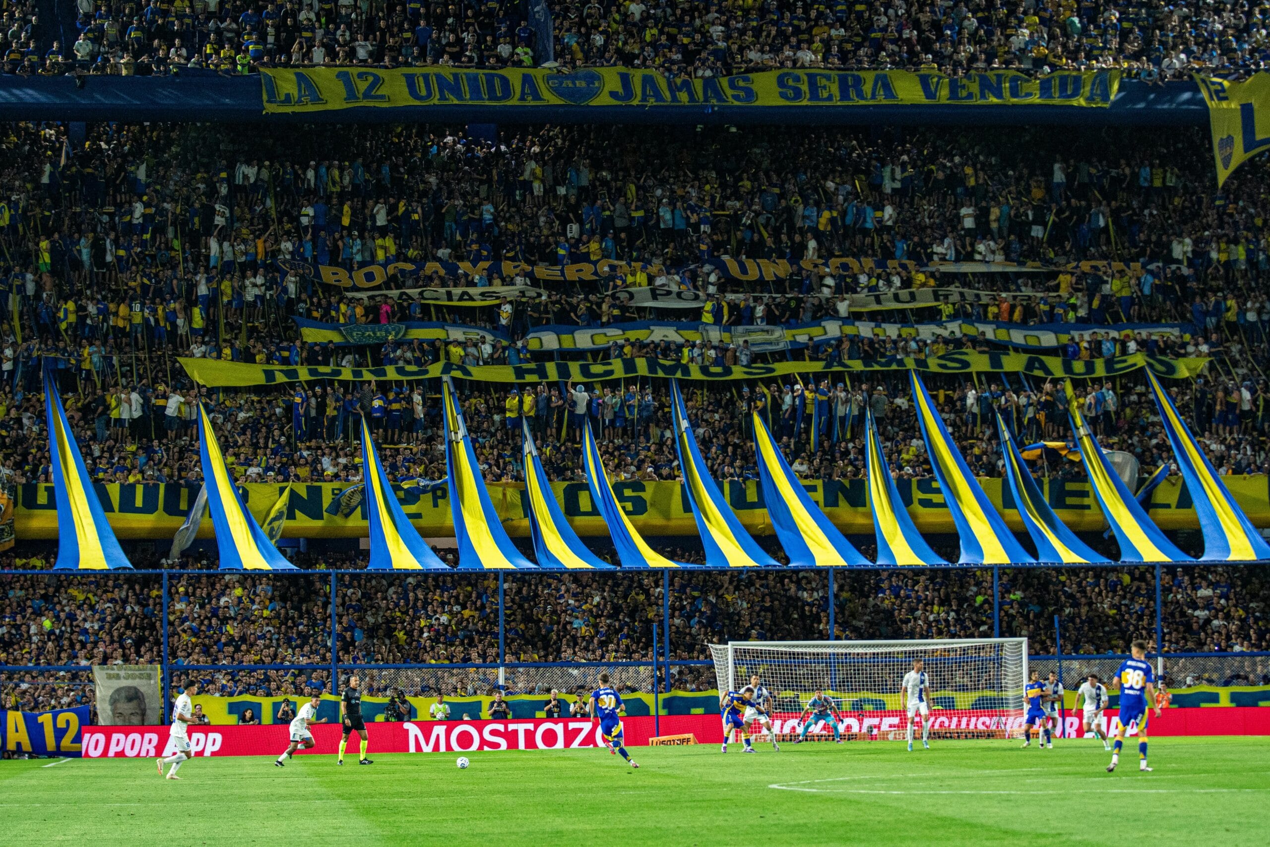 Supporters filling the steep stands of a Buenos Aires football stadium